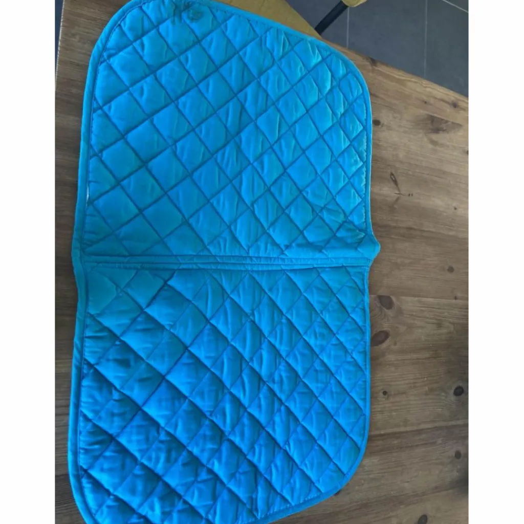 Tapis bleu*Fouganza Online